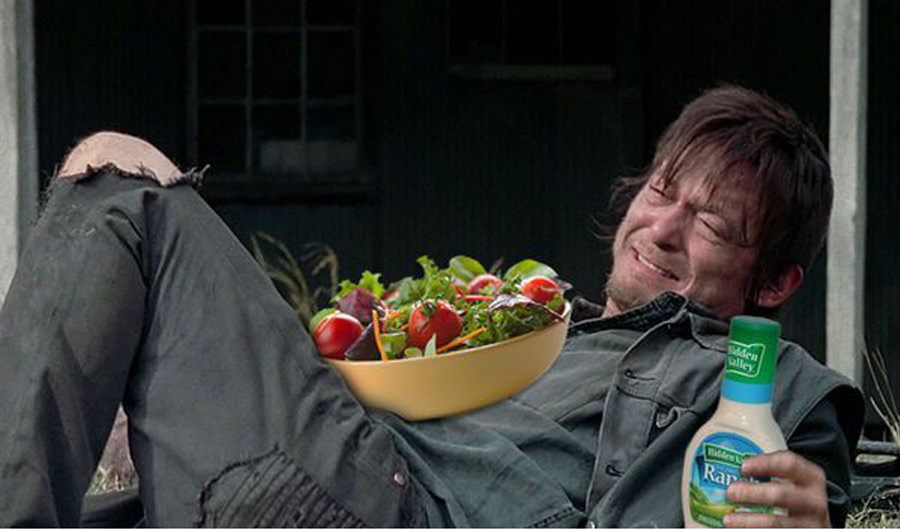 daryl-laughing-alone-with-salad