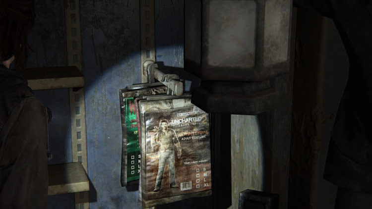 لباس نیتن دریک از آنچارتد در فروشگاه تخلیه شده در آخرالزمان بازی The Last of Us 2