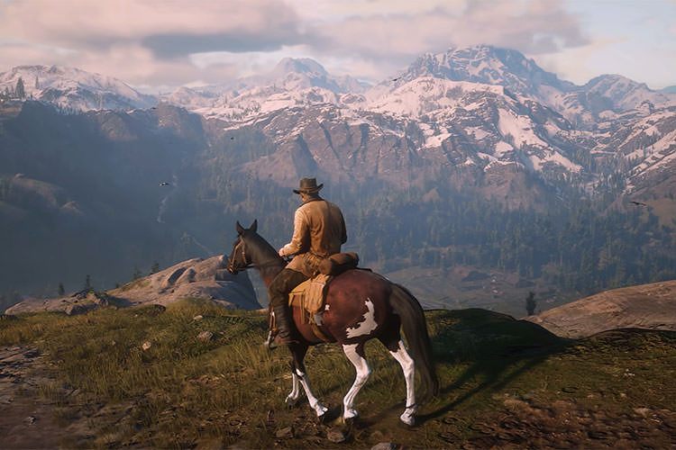 آرتور مورگان برفراز کوه به همراه اسب خود در بازی Red Dead Redemption 2