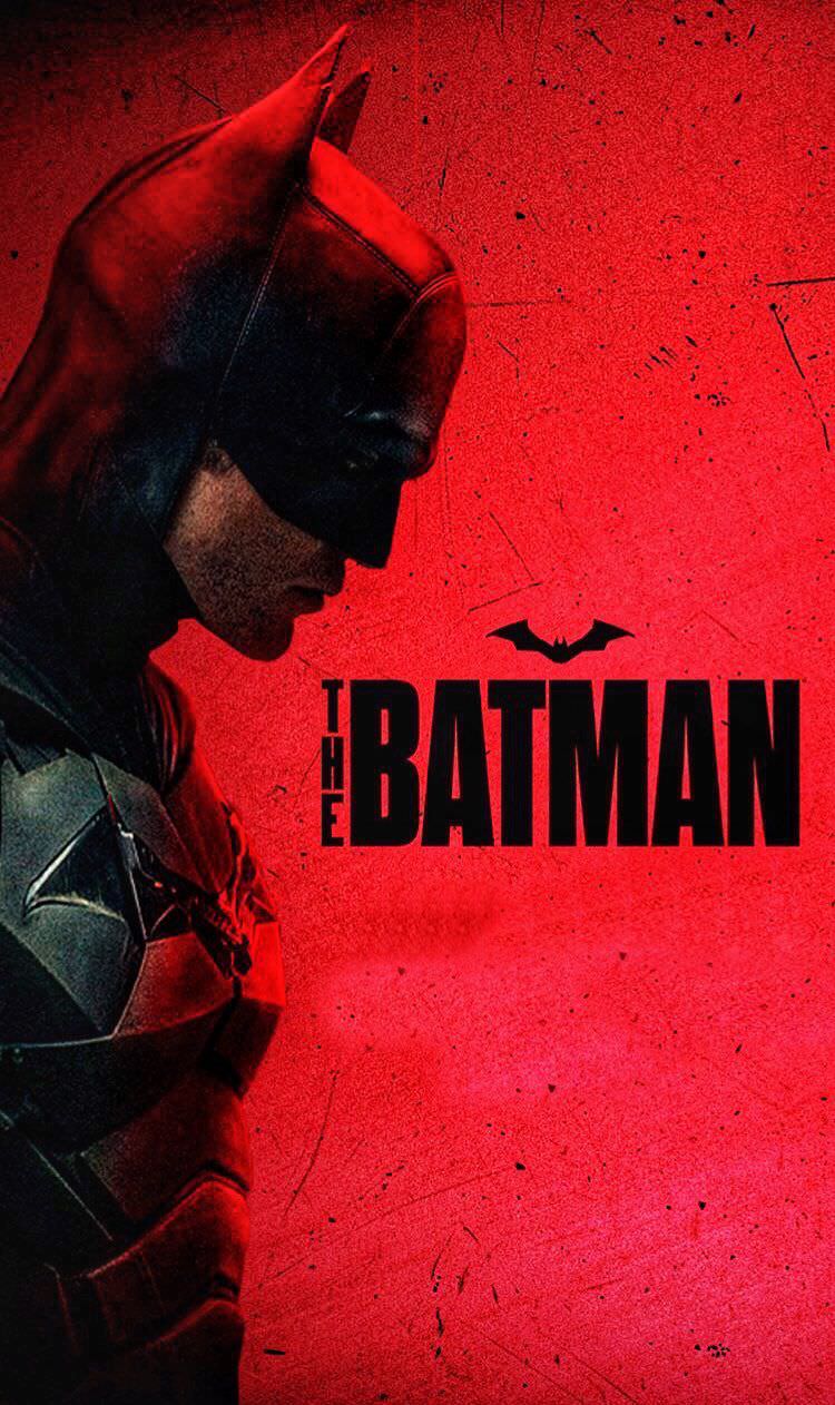 بتمن رابرت پتینسون در زاویه نیم رخ در پوستر تبلیغاتی فیلم The Batman 