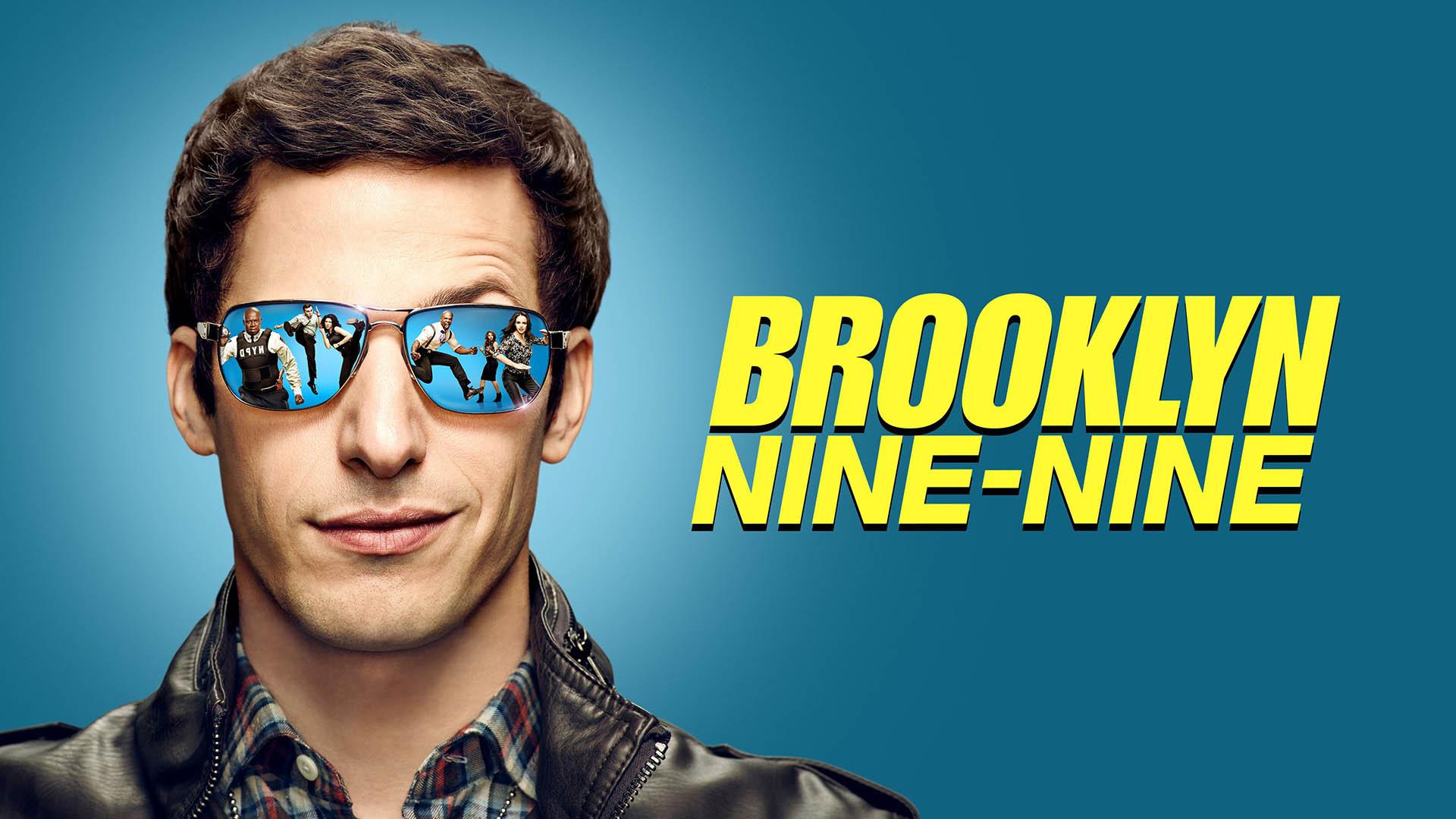 کاور سریال Brooklyn Nine-Nine و تصویری از اندی سمبرگ با عینک دودی