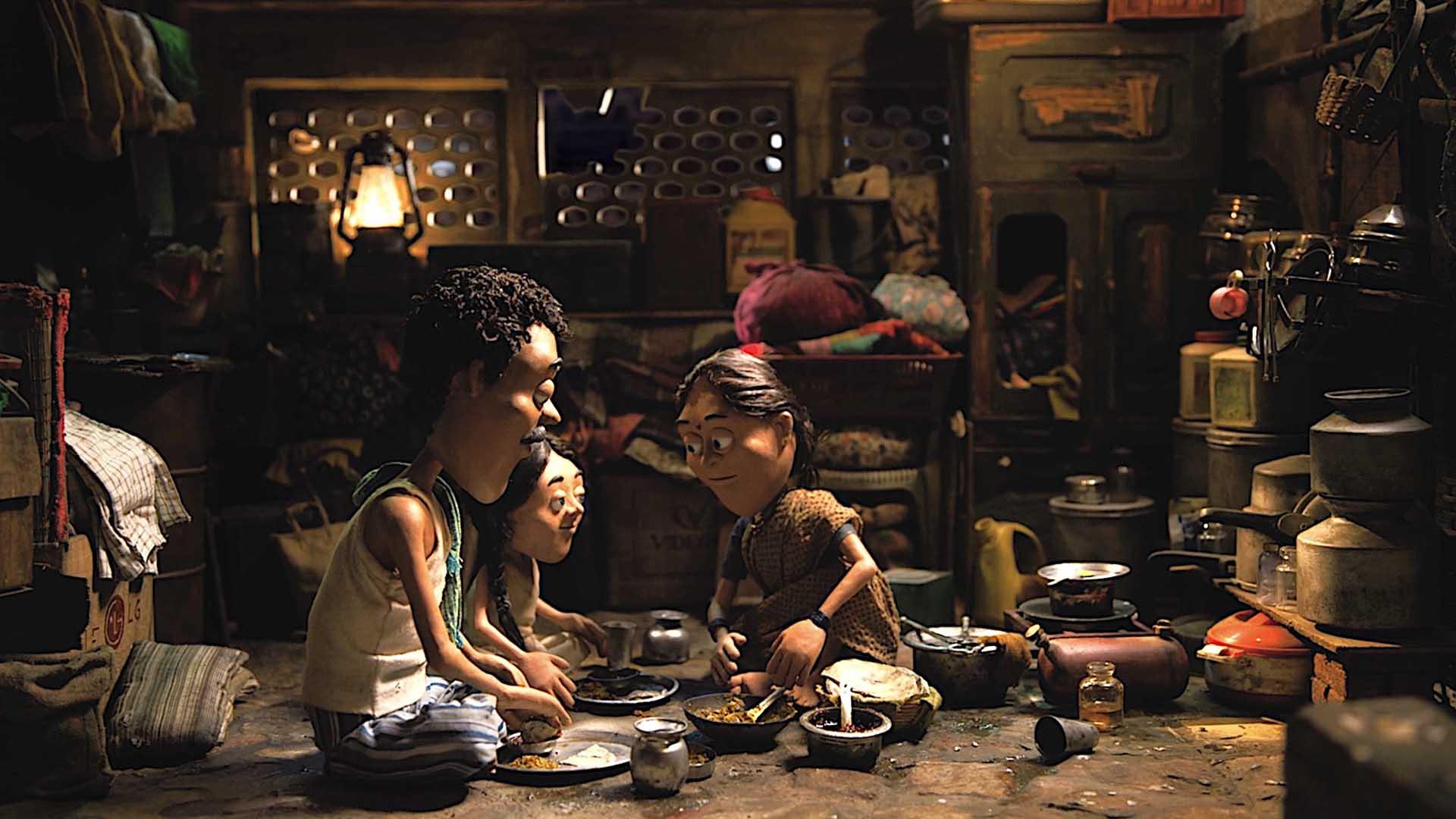 خانواده‌ای در انیمیشن کوتاه Tokri در حال غذا خوردن هستند