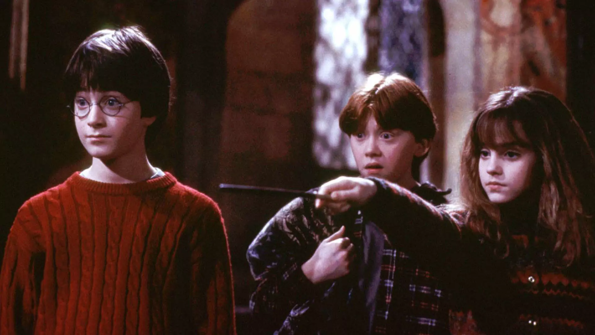 هری به همراه هرمیون و ران در فیلم Harry Potter and the Philosopher's Stone