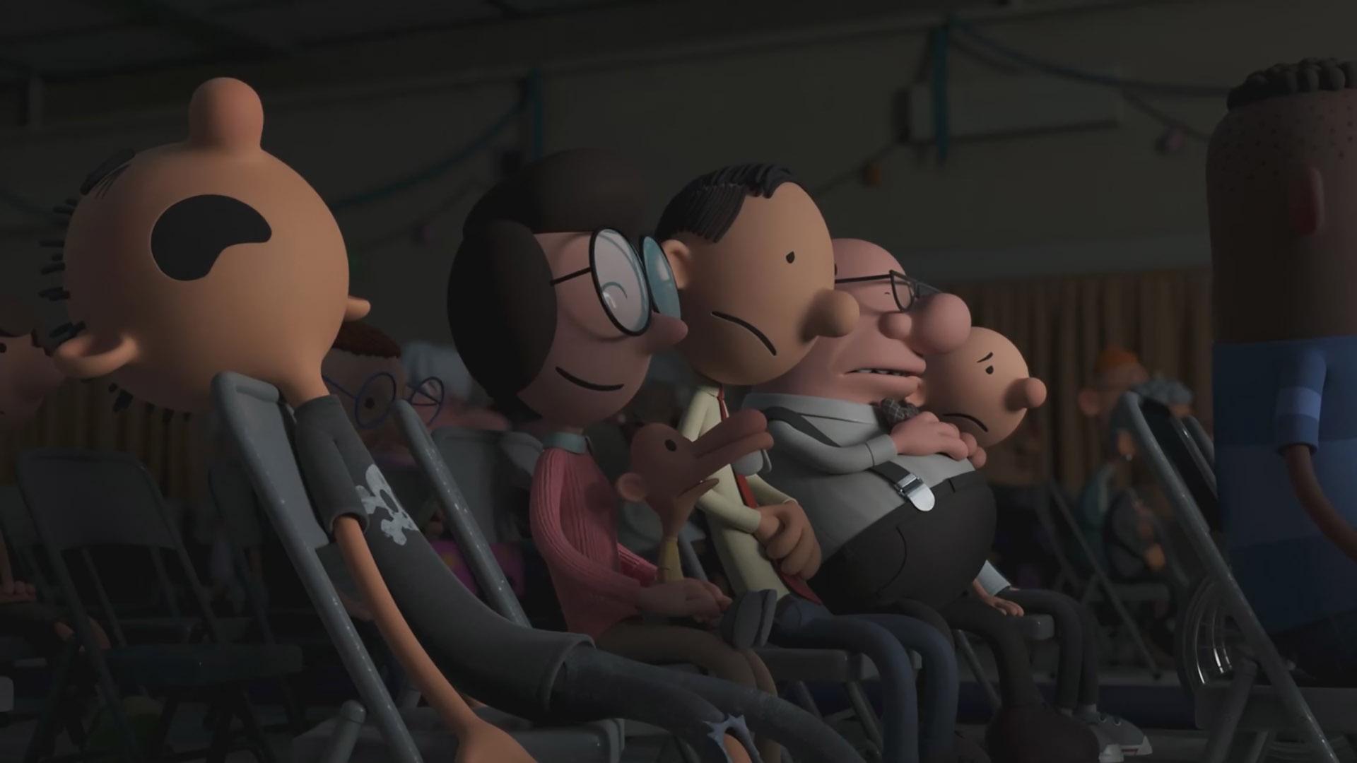 خانواده‌ی هفلی، نشسته بر روی صندلی، در حال تماشای اجرا در انیمیشن Diary of a wimpy kid