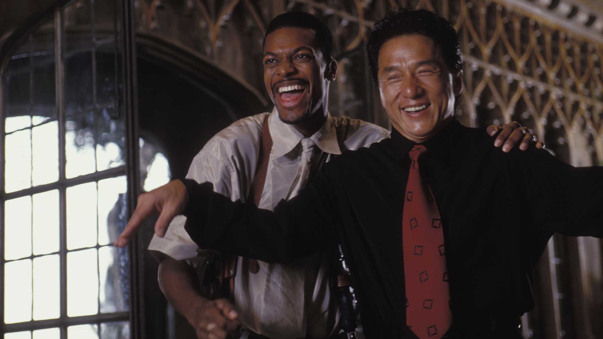 لبخند جکی چان در فیلم Rush Hour، محصول سال ‍۱۹۹۸ میلادی