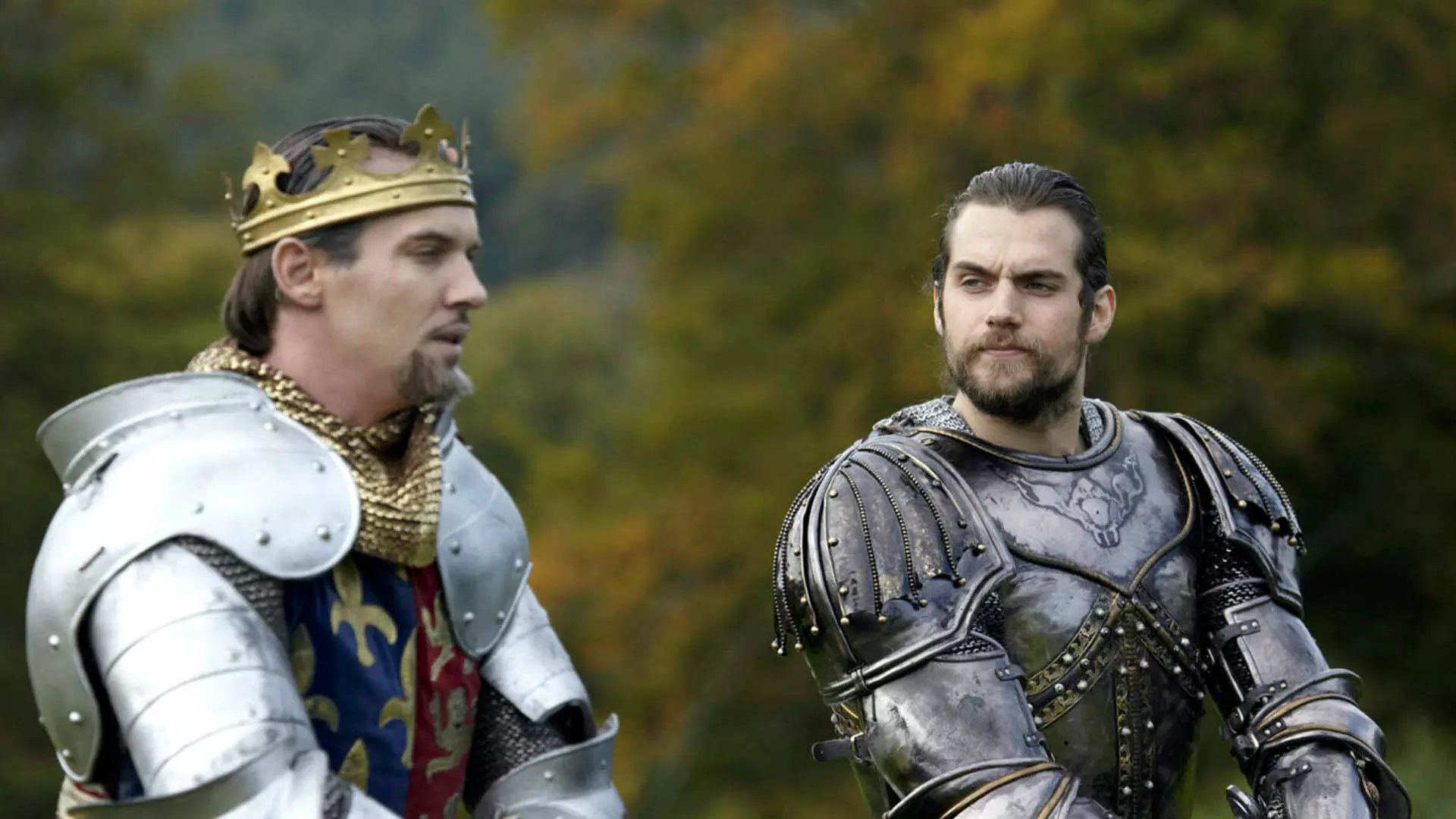 هنری کویل با لباس رزم در کنار پادشاه در سریال The Tudors
