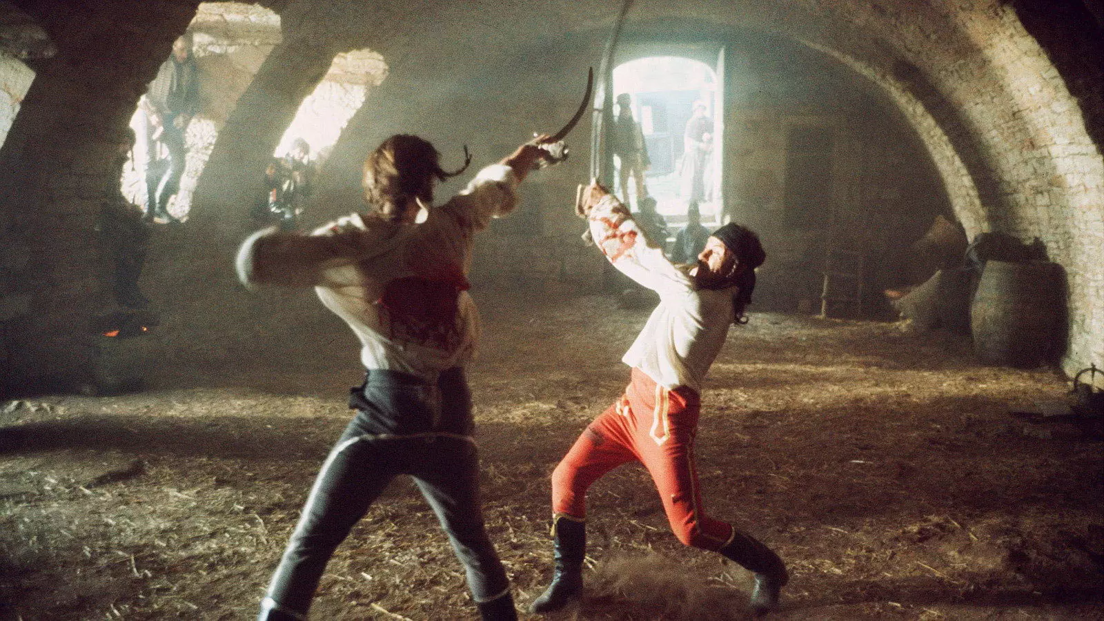 هاروی کایتل و کیت کارادین در حال مبارزه با شمشیر در فیلم دوئل بازها