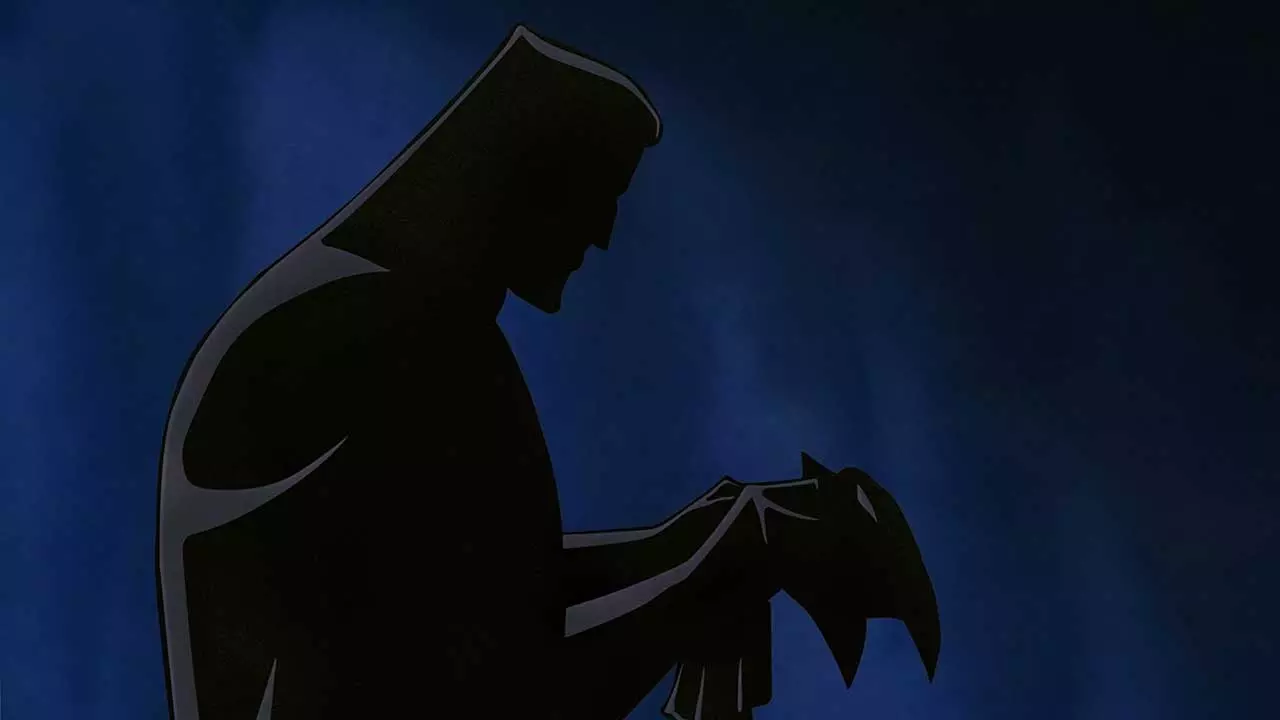 نقاب در دستان بتمن در انیمیشن Batman: Mask of the Phantasm، یکی از برترین فیلم های ابرقهرمانی تاریخ سینما