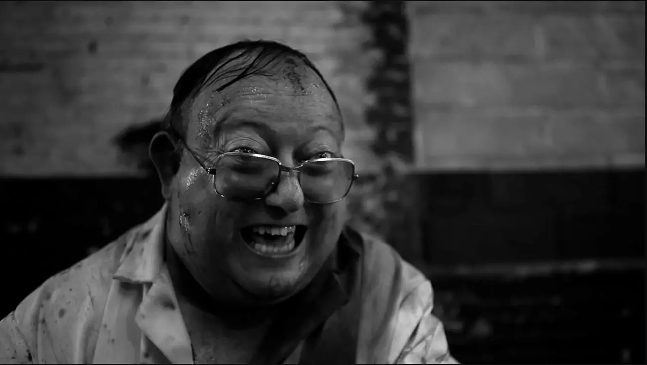 Lawrence Harvey in the film The Human Centipede in a Blood Covered Cloak