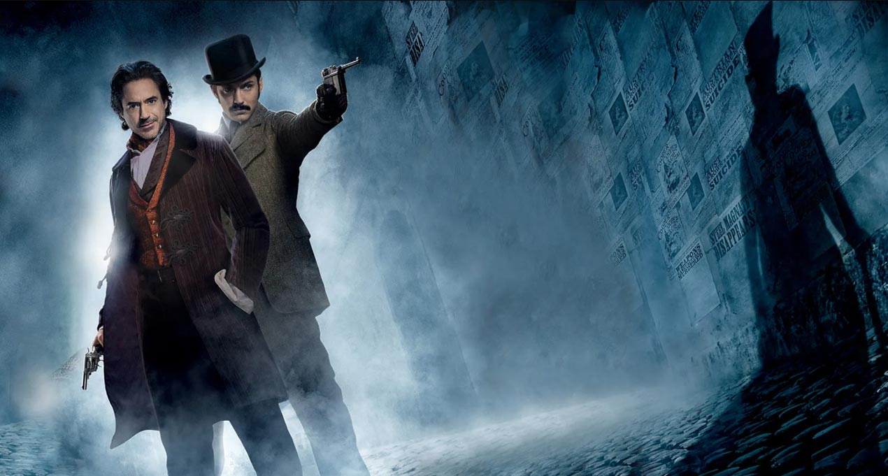 داونی جونیور و جود لاو در نقش شرلوک هولمز و جان واتسون اسلحه به دست در میان مه